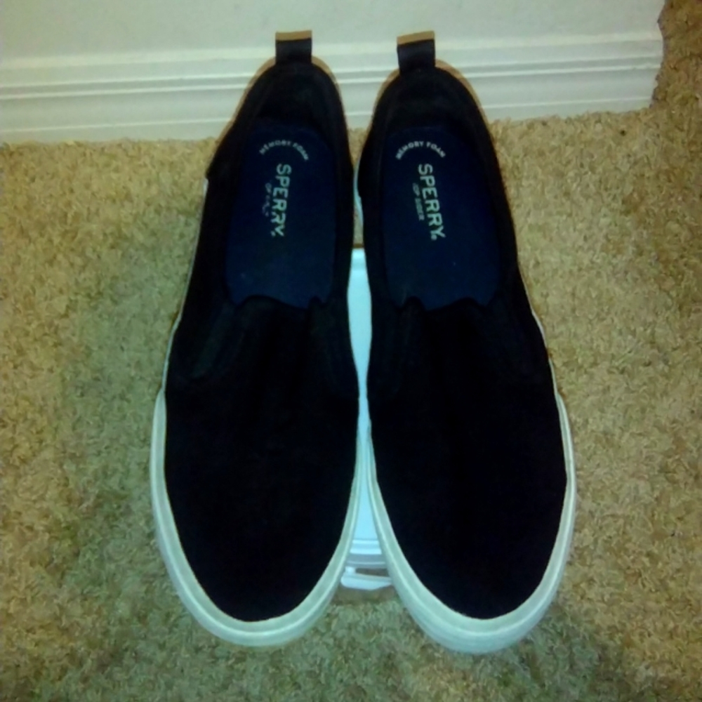 Black Sperry slip on